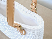 Load image into Gallery viewer, top view of a crochet bag with brown leather straps