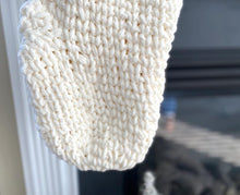 Load image into Gallery viewer, the toe of a crochet christmas stocking