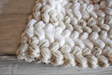 Load image into Gallery viewer, close up of braided puff stitch
