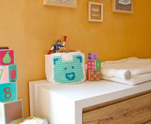 Load image into Gallery viewer, blue crochet bear basket with toys around