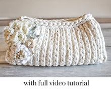 Load image into Gallery viewer, ribbed crochet bag with a gold zip and crochet flowers on the side