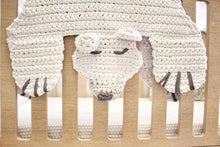 Load image into Gallery viewer, crochet bear rug hanging over a crib

