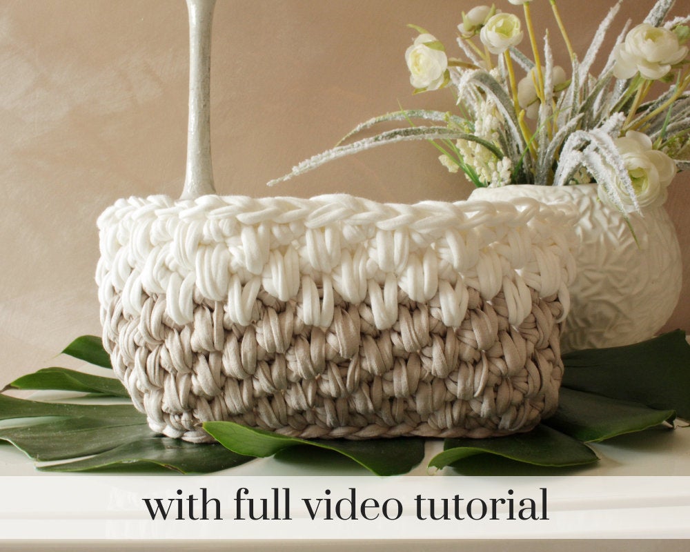Tan and white crochet storage basket 