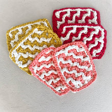 Load image into Gallery viewer, red and yellow and pink zig zag potholders 
