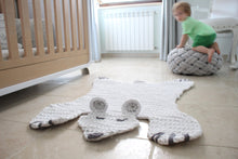 Load image into Gallery viewer, crochet bear rug with child in the background
