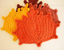 Load image into Gallery viewer, pile of crochet maple leaves
