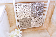 Load image into Gallery viewer, white and gray granny squares rug hanging in bathroom
