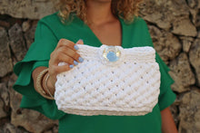 Load image into Gallery viewer, girl with green dress holding out a crochet bag
