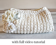 Load image into Gallery viewer, ribbed crochet bag with a gold zip and crochet flowers on the side
